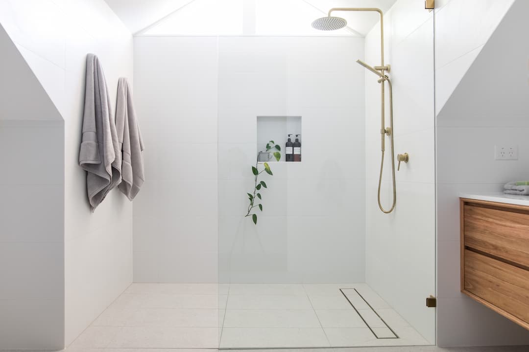 Neutral Wet Room with gold shower